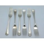 Six matched silver forks including three Sheffield
