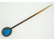 A 19thC. yellow metal tie pin set with turquoise & rose cut diamonds with original box, tests electr