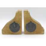 A pair of House of Commons stone book ends with br