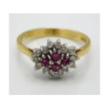 An 18ct gold ring set with ruby & diamond, size M,