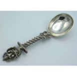 A well worked Indian white metal spoon with Indian