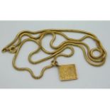 An 18ct gold chain & with Hebrew Psalm pendant, 24