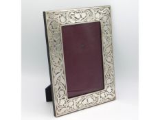 A 1997 London silver photo frame by Paul Vernon Fitchie of organic design, 10.75in high x 8in wide,