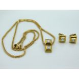 An 18ct gold necklace & pendant with matching earring set. Approx. one carat of princess cut diamond