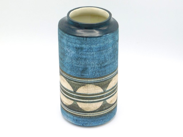 A Troika cylindrical vase by Anne Jones, 7.75in ta