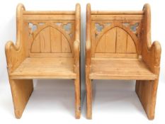 A pair of 19thC. pitch pine Gothic style chairs, originally from a French church, 23.5in wide x 39in