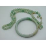A vintage jade necklace & bangle, necklace require