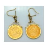 A pair of 9ct King George VI half sovereigns mount