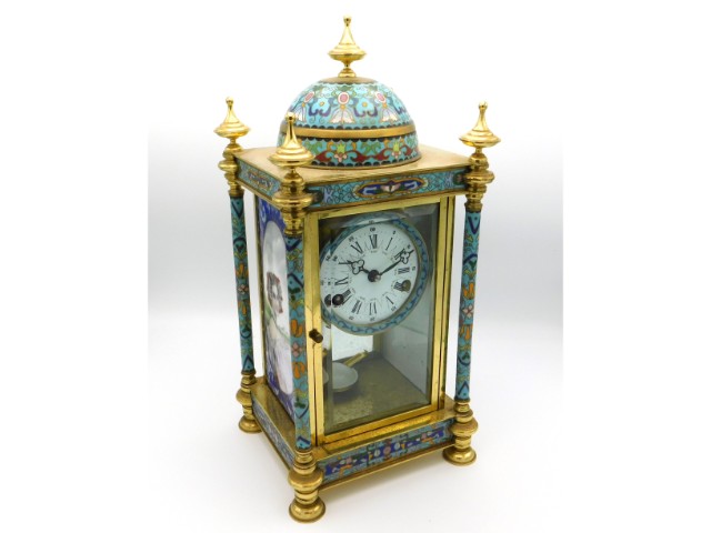 A French brass cloisonne clock with domed top & en