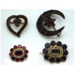 Four Victorian & early 19thC. brooches set with garnet & foil backed stones in both yellow & white m
