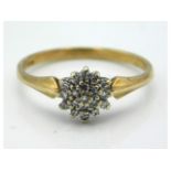 A small 9ct gold diamond cluster ring of approx. 0