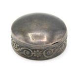 A silver pill box, lining relined in green felt co