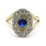 A two colour gold diamond & sapphire ring set with