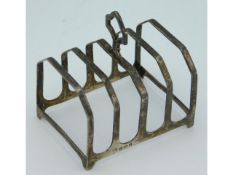 A 1922 Birmingham silver toast rack by Adie Bros.
