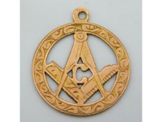 A 9ct rose gold masonic pendant, 19.5mm diameter,