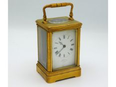 A J. W. Benson brass carriage clock with key, 6.12
