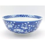 A Chinese porcelain prunus blossom bowl, 7.25in di
