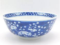 A Chinese porcelain prunus blossom bowl, 7.25in di