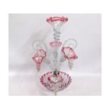 A Victorian cranberry tipped glass epergne with th