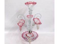 A Victorian cranberry tipped glass epergne with th
