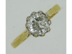 An 18ct gold solitaire ring with Tiffany style pla