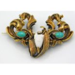 A Victorian yellow metal brooch set with turquoise