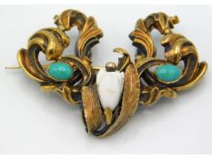 A Victorian yellow metal brooch set with turquoise