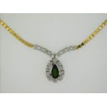 A 14ct gold necklace set with green tourmaline & 0.18ct of illusion set diamonds, 19in long, 10.9g,