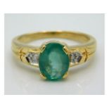 An 18ct gold emerald & diamond ring, size N, emera
