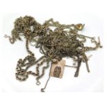 A quantity of mixed silver & white metal chains &