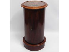 A 19thC. cylinder cabinet with marble insert, split to top rim of wood, 28.75in tall x 15in diameter