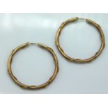 A pair of hoop earrings with rope twist decor, 2.8