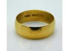 A 22ct gold band, size M/N, 3.2g