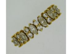 An 18ct gold half eternity ring set with approx. 0.84ct of diamond, size O, 3.8g