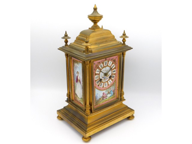 A French 19thC. Le Roy & Fils gilt bronze clock with Sevres style porcelain panels, 14in tall