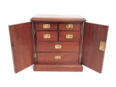 A small 19thC. mahogany cabinet with six drawers w