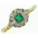 An antique art deco 18ct gold emerald & diamond ri
