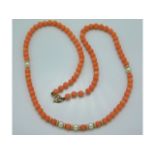 A coral & pearl necklace with 9ct gold link & clas