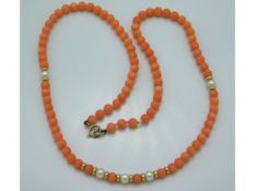 A coral & pearl necklace with 9ct gold link & clas