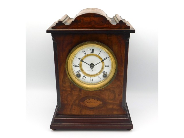 An Edwardian Seikosha chiming mantle clock, inlaid