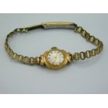 An 18ct gold cased ladies 21 ruby movement wristwa
