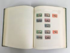 A stamp album of mixed mostly mint stamps includin