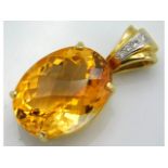 An 18ct gold pendant set with large citrine main s