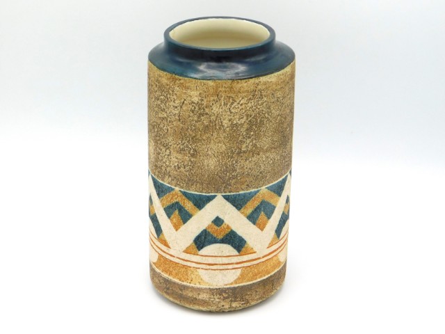 A Troika cylindrical vase by Louise Jinks, 7.75in