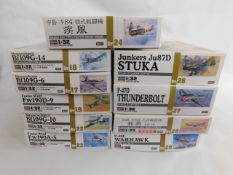 Ten boxed Hasegawa 1:32 scale model aircraft kits,