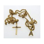 An 18ct gold chain, 18in long with 18ct gold cross
