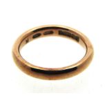 A 19thC. 9ct rose gold band, date mark for 1865, 4