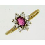 A 9ct gold ring set with ruby & paste stones, 1g,