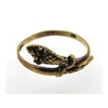A 9ct gold snake ring with ruby eyes, 1.2g, size K