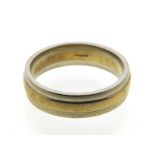 A 9ct gold two tone band, 4.7g, size N/O